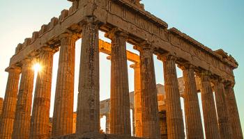 Sunrise image of ancient Greek temple.