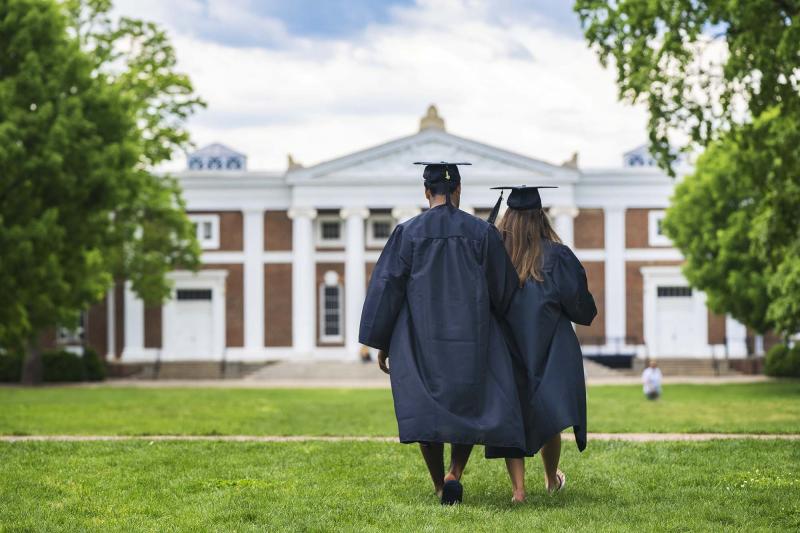 Students in graduation cap and gown UVA