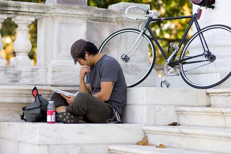 A student listens to digital music. The music he's hearing, though, varies subtly from what was initially recorded in the studio.